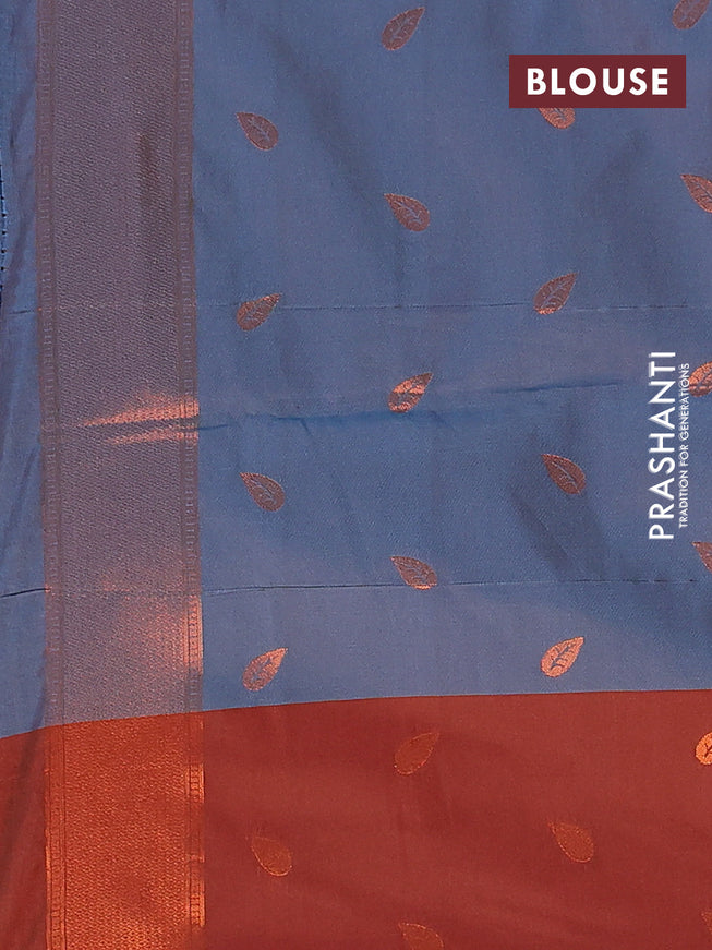 Semi soft silk saree dual shade of blue and rust shade with copper zari woven leaf buttas and copper zari woven border