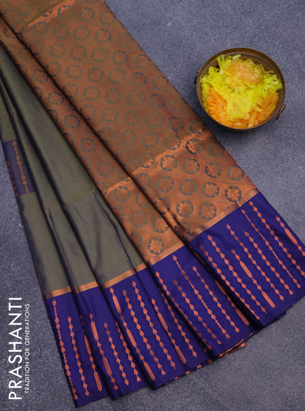 Semi soft silk saree dual shade of greenish blue and blue with box type zari buttas and copper zari woven bordder