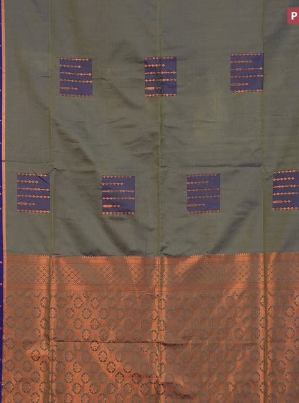 Semi soft silk saree dual shade of greenish blue and blue with box type zari buttas and copper zari woven bordder