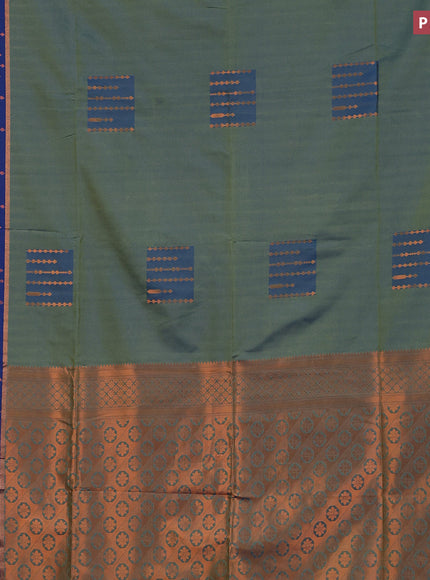 Semi soft silk saree dual shade of green and blue with box type zari buttas and copper zari woven bordder