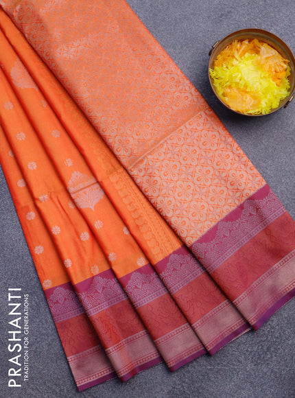 Semi soft silk saree orange and purple with allover zari woven buttas and zari woven border