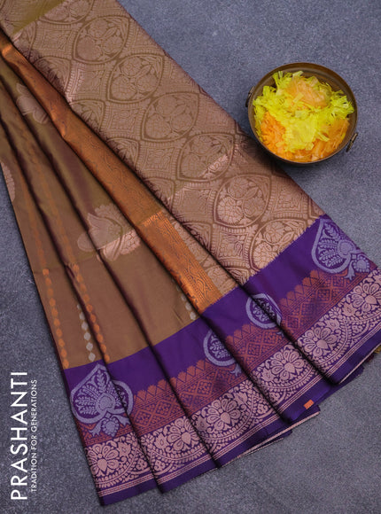 Semi soft silk saree dual shade of oilve green and violet shade with allover zari weaves & buttas and zari woven border