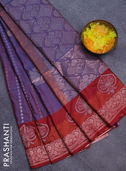 Semi soft silk saree dual shade of bluish maroon and maroon with allover zari weaves & buttas and zari woven border