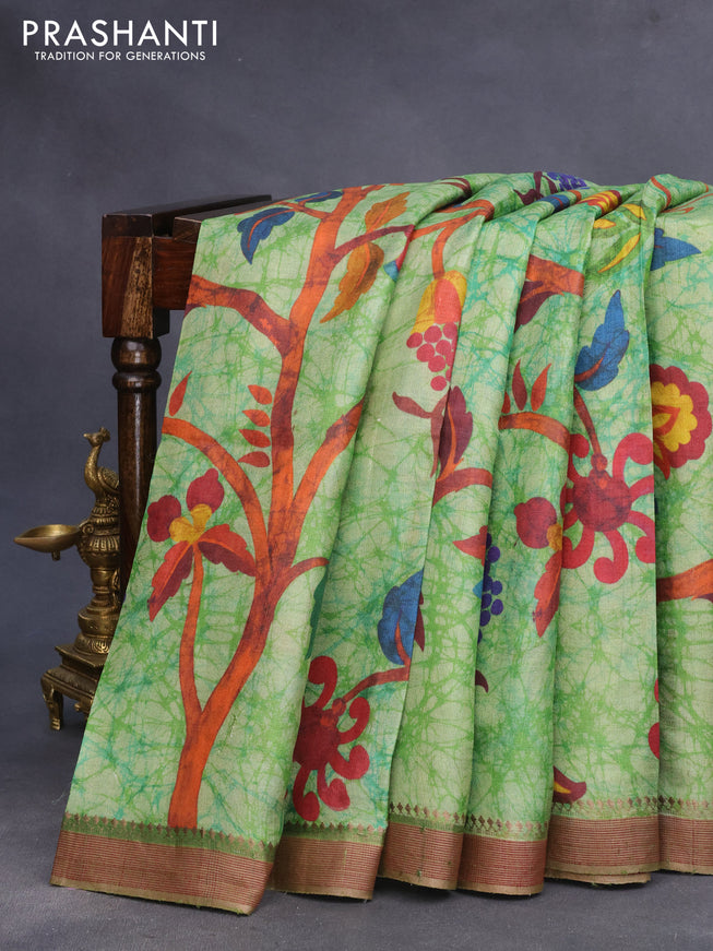 Pure tussar silk saree light green and pastel brown with allover prints and thread woven border