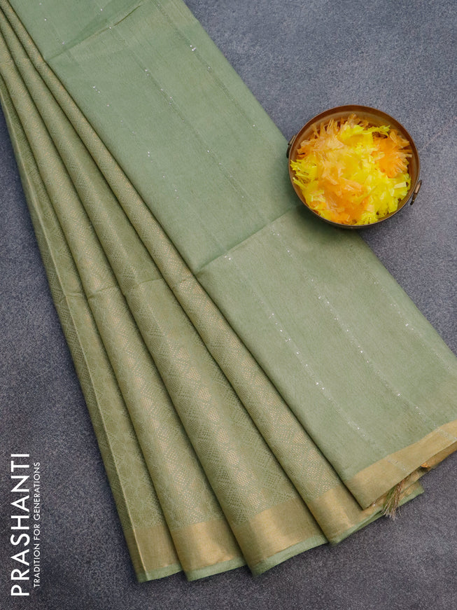 Munga jacquard saree pastel green with allover geometric zari weaves & sequin work pallu and zari woven border