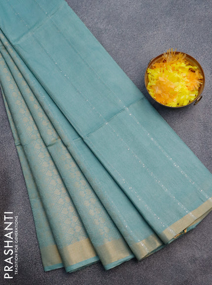 Munga jacquard saree pastel blue shade with allover geometric zari weaves & sequin work pallu and zari woven border