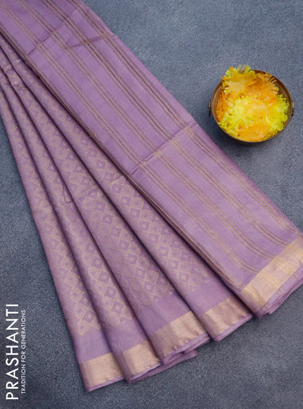 Munga jacquard saree mild lavender shade with allover zari weaves and zari woven border