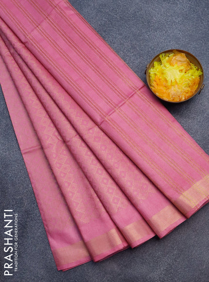 Munga jacquard saree pink shade with allover zari weaves and zari woven border