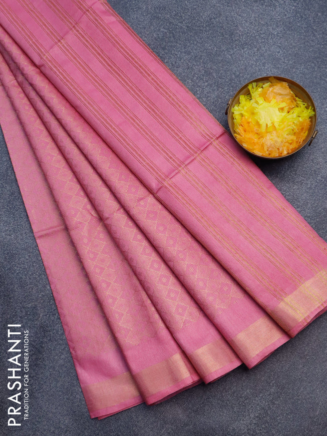 Munga jacquard saree pink shade with allover zari weaves and zari woven border