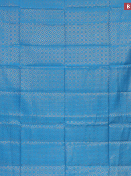 Munga jacquard saree light blue with allover zari weaves and zari woven border