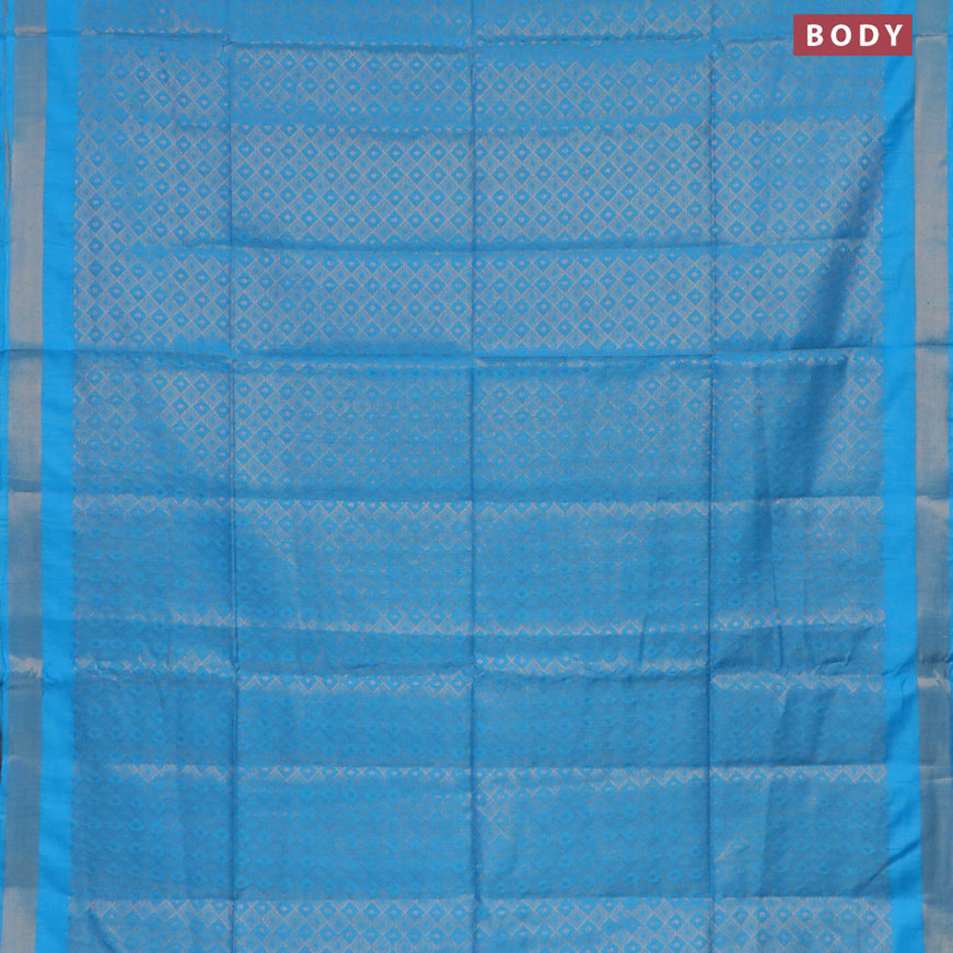 Munga jacquard saree light blue with allover zari weaves and zari woven border