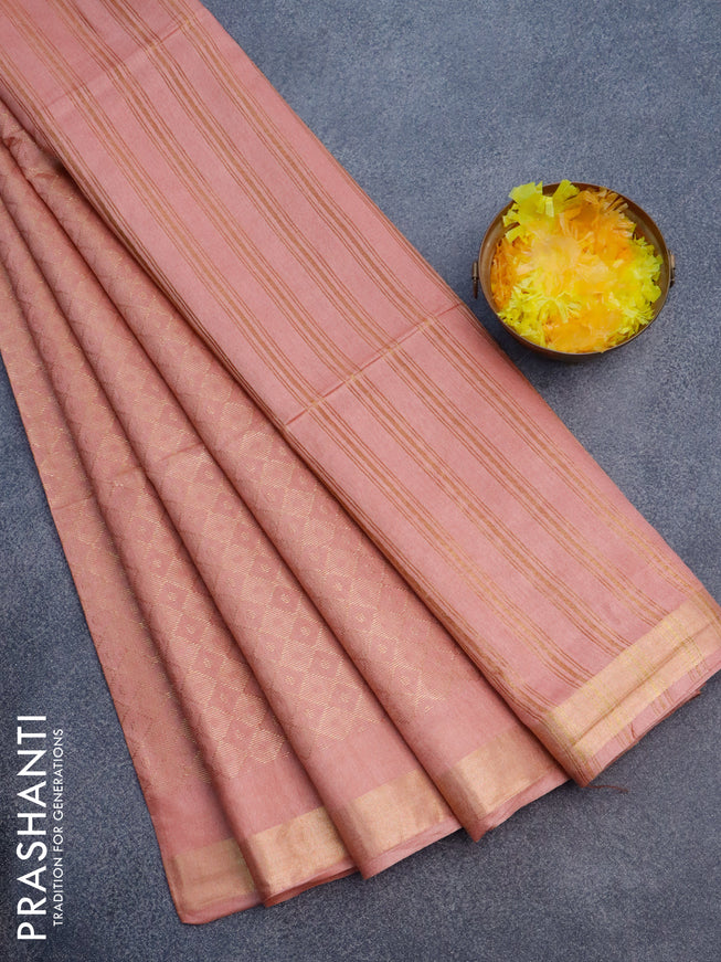 Munga jacquard saree peach shade with allover zari weaves and zari woven border