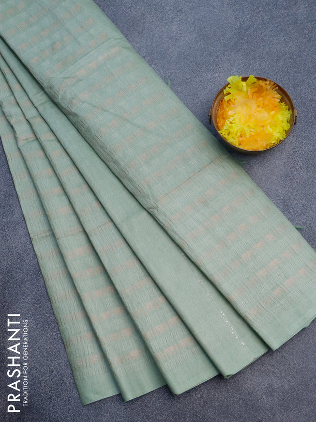 Munga jacquard saree pastel green with allover zari weaves and sequin work pallu