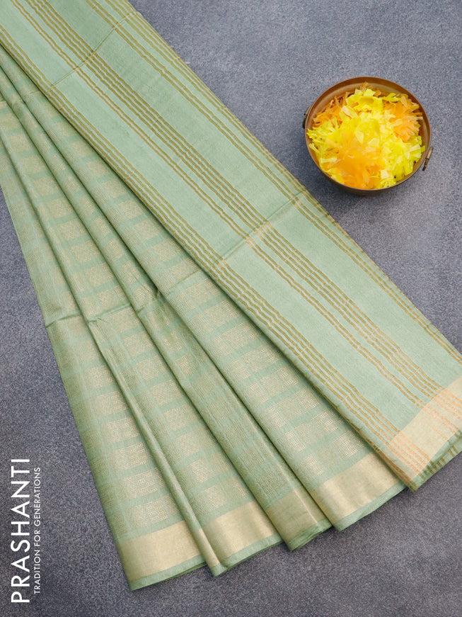 Munga jacquard saree pastel green with allover geometric zari weaves and zari woven border