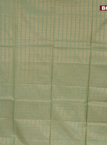 Munga jacquard saree pastel green with allover geometric zari weaves and zari woven border