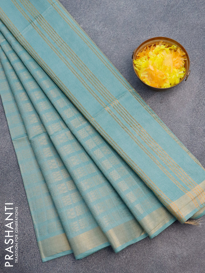 Munga jacquard saree pastel blue with allover geometric zari weaves and zari woven border