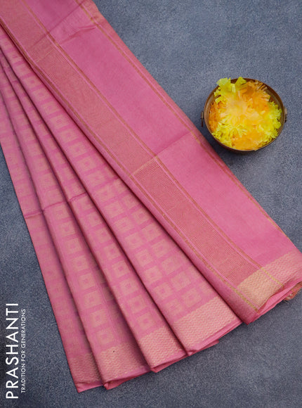 Munga jacquard saree pink shade with allover zari weaves and zari woven border