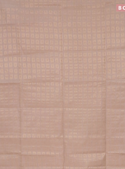 Munga jacquard saree beige with allover zari weaves and zari woven border