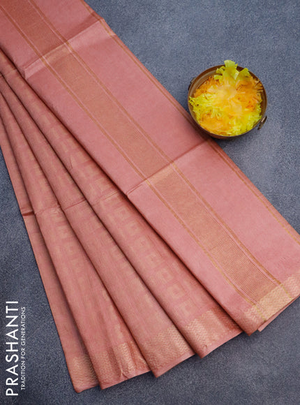 Munga jacquard saree peach pink with allover zari weaves and zari woven border