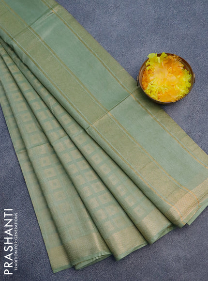 Munga jacquard saree pastel green with allover zari weaves and zari woven border