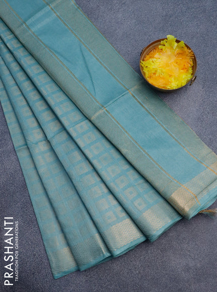 Munga jacquard saree pastel blue with allover zari weaves and zari woven border