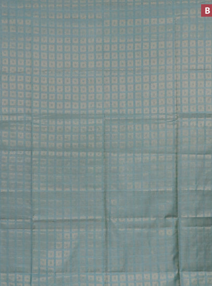 Munga jacquard saree pastel blue with allover zari weaves and zari woven border