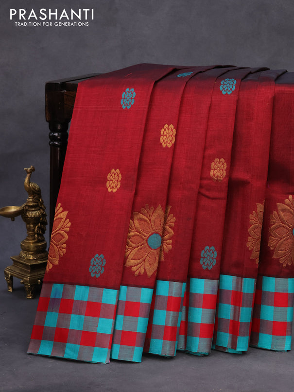 Kuppadam silk cotton saree maroon and teal green shade with thread & zari zari woven buttas and checked border