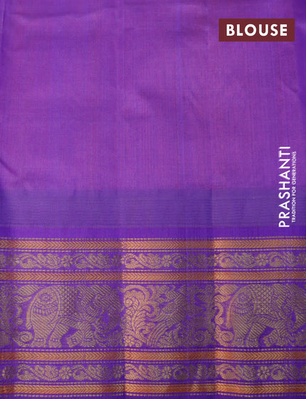 Kuppadam silk cotton saree dual shade of orange and lavender with allover zari checks & 1000 buttas and temple design zari woven border