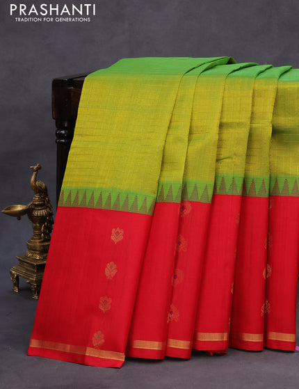 Kuppadam silk cotton saree dual shade of light green and red with allover zari checked pattern and temple design long zari woven butta border