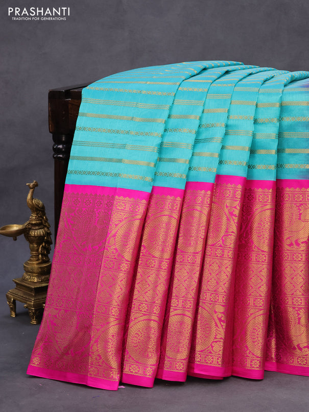 Kuppadam silk cotton saree teal blue and pink with allover zari woven stripe pattern and long annam & rudhraksha zari woven border