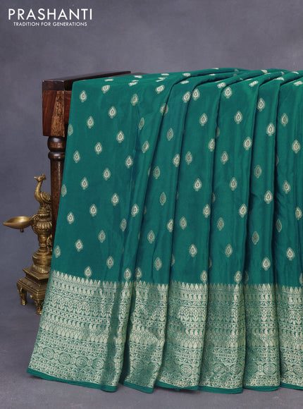 Semi crepe saree peacock green with thread woven buttas and thread woven border