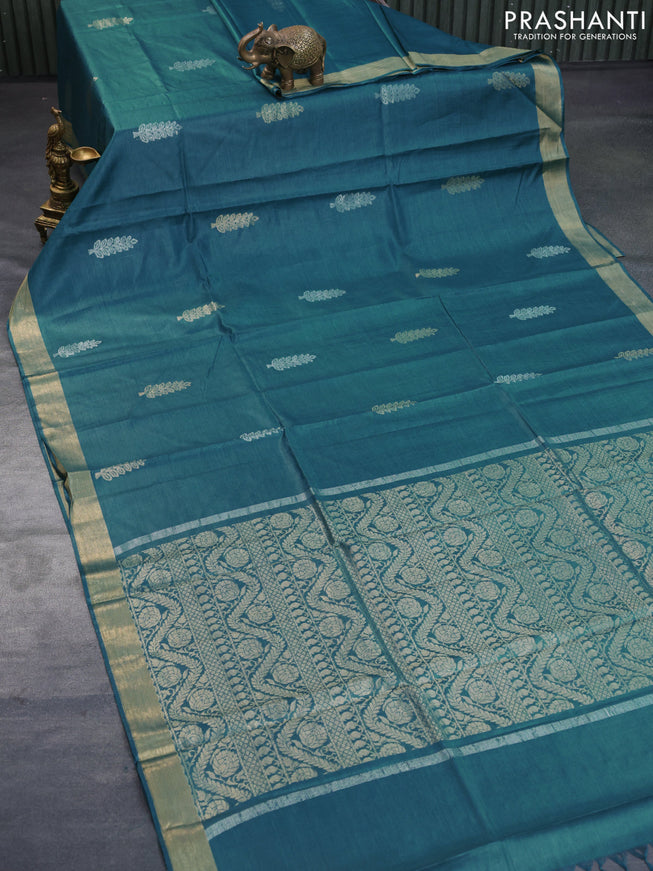 Banana silk saree teal blue shade with silver & gold zari woven buttas and zari woven border