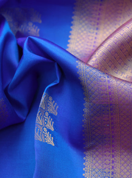 Pure kanchipuram silk saree blue and dual shade of purple with allover self emboss & buttas and rich zari woven border