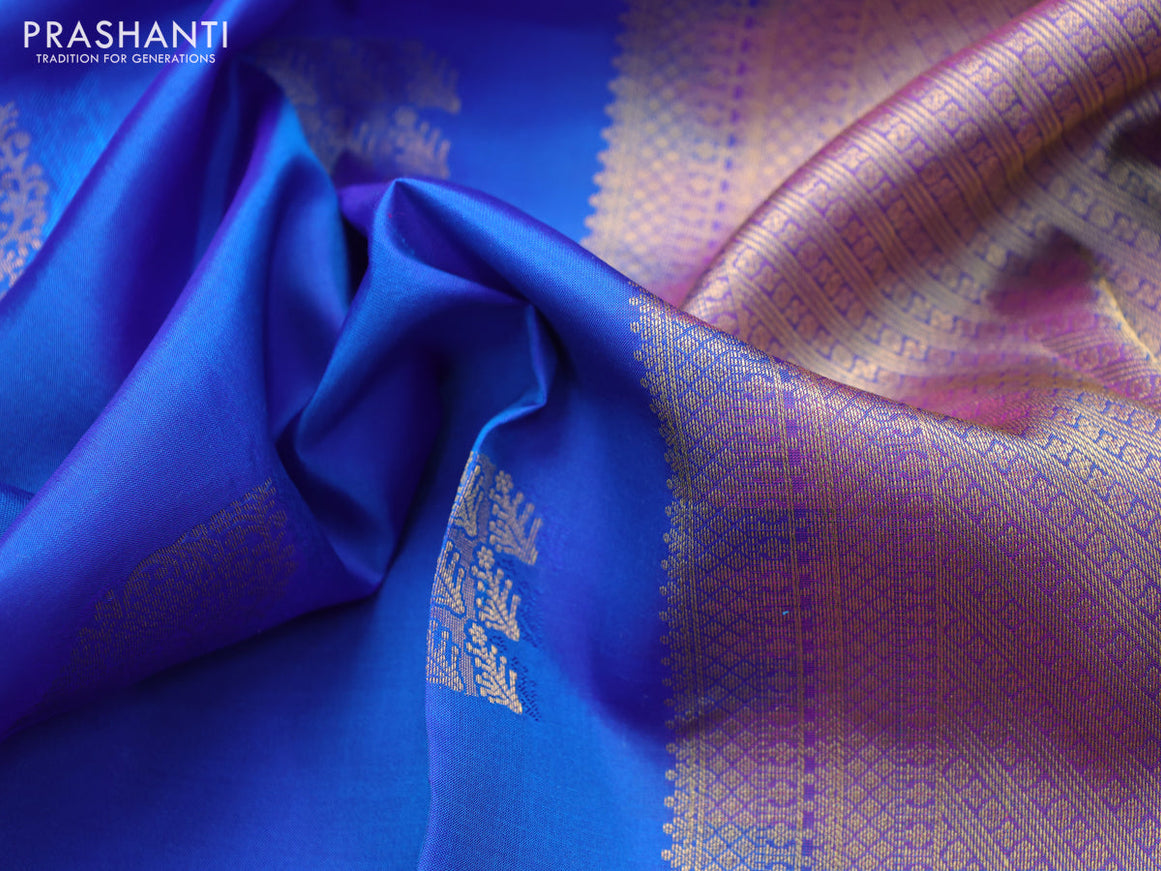 Pure kanchipuram silk saree blue and dual shade of purple with allover self emboss & buttas and rich zari woven border