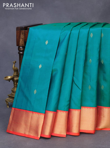 Pure kanchipuram silk saree teal shade and dual shade of orange with zari woven buttas and zari woven korvai border