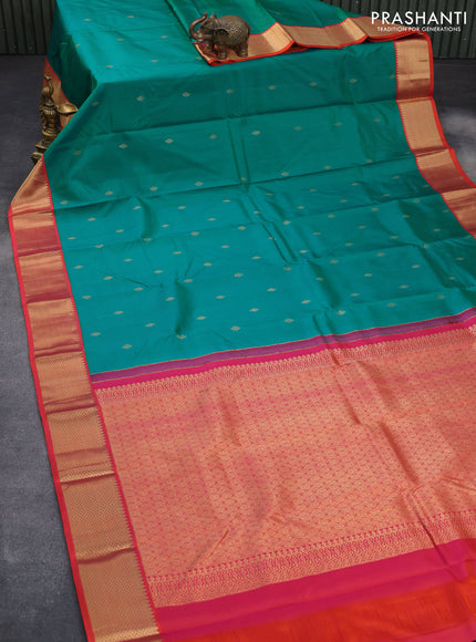 Pure kanchipuram silk saree teal shade and dual shade of orange with zari woven buttas and zari woven korvai border