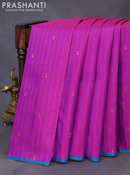 Pure kanchipuram silk saree purple and teal green with allover copper zari weaves & buttas and thread woven piping border