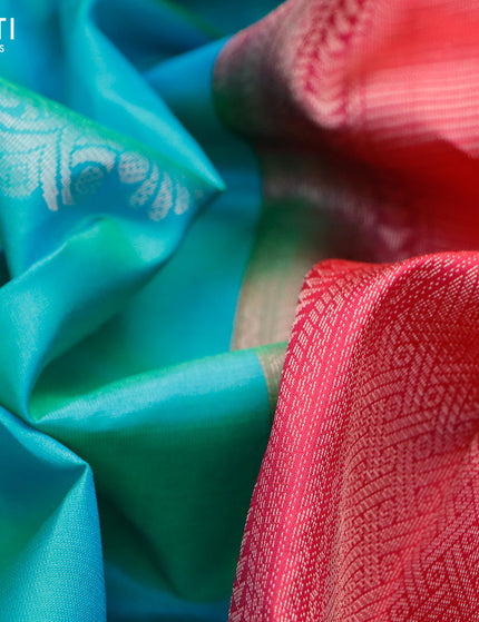 Pure kanchipuram silk saree dual shade of teal bluish green and dark pink with silver zari woven buttas in borderless style