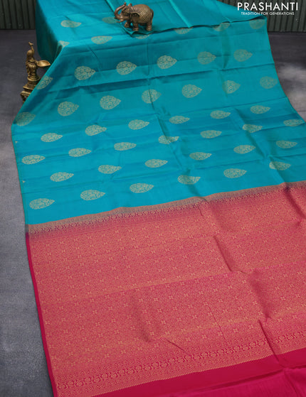 Pure kanchipuram silk saree teal green and pink with zari woven buttas in borderless style