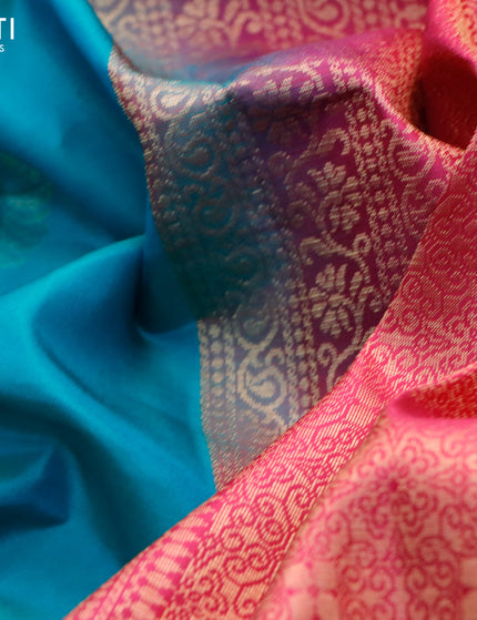 Pure kanchipuram silk saree teal green and pink with zari woven buttas in borderless style