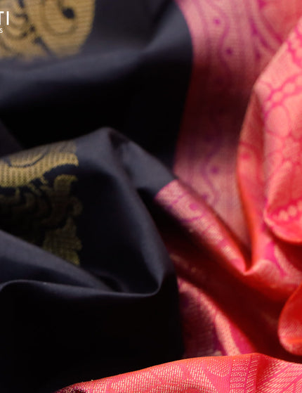 Pure kanchipuram silk saree black and dual shade of pinkish orange with zari woven buttas in borderless style