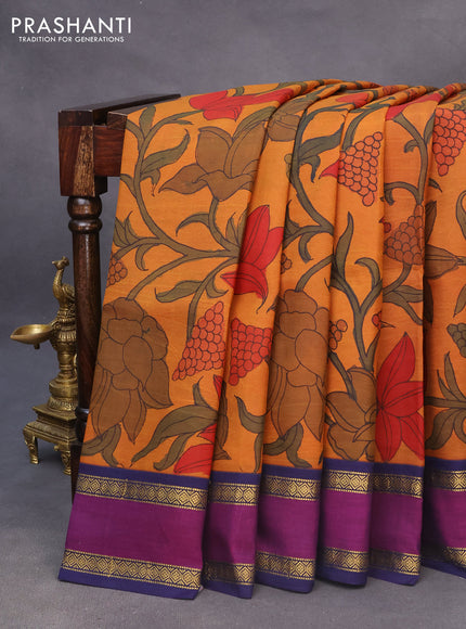 Pure kanchipuram silk saree mustard shade and blue with allover pen kalamkari prints and rettapet zari woven korvai border