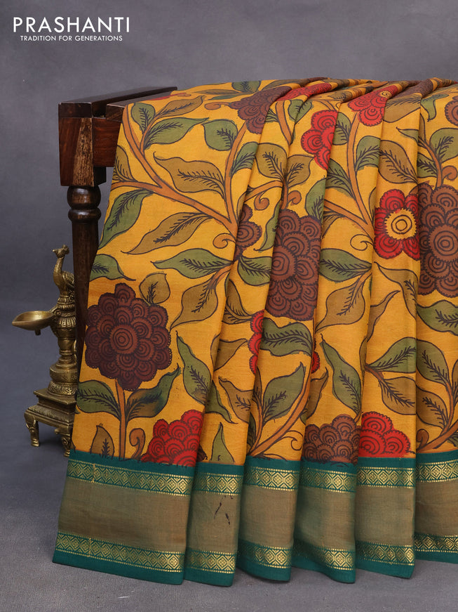 Pure kanchipuram silk saree mustard yellow and green with allover pen kalamkari prints and rettapet zari woven korvai border