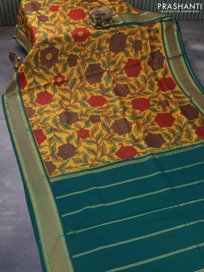 Pure kanchipuram silk saree mustard yellow and green with allover pen kalamkari prints and rettapet zari woven korvai border