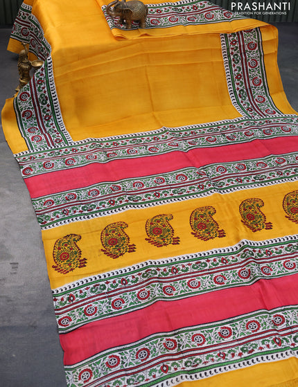 Bishnupuri silk saree yellow and off white with plain body and printed border