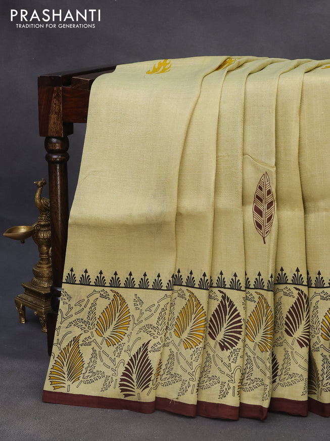 Bishnupuri silk saree pale yellow and brown with butta prints and printed border