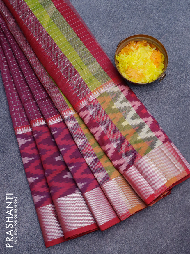 Semi mangalgiri silk saree wine shade and maroon with allover silver zari checked pattern and long silver zari ikat style border