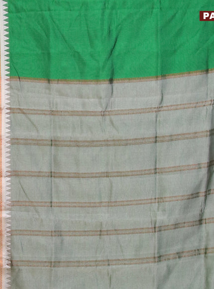 Semi mangalgiri silk saree green and grey with plain body and temple design copper zari woven border