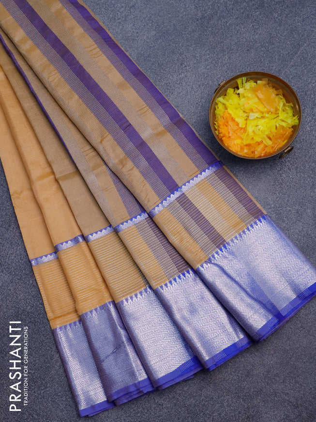 Semi mangalgiri silk saree sandal and blue with plain body and long silver zari woven border