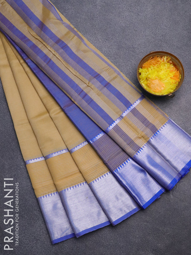 Semi mangalgiri silk saree sandal and blue with plain body and long silver zari woven border